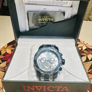 SOLD 
Invicta Silver and Black Chronograph Watch